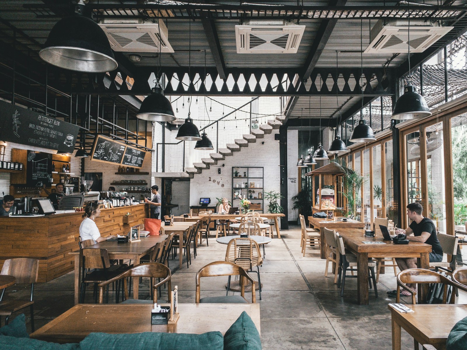 Dubai neighborhood café interior in soft daylight — UAE local brandable